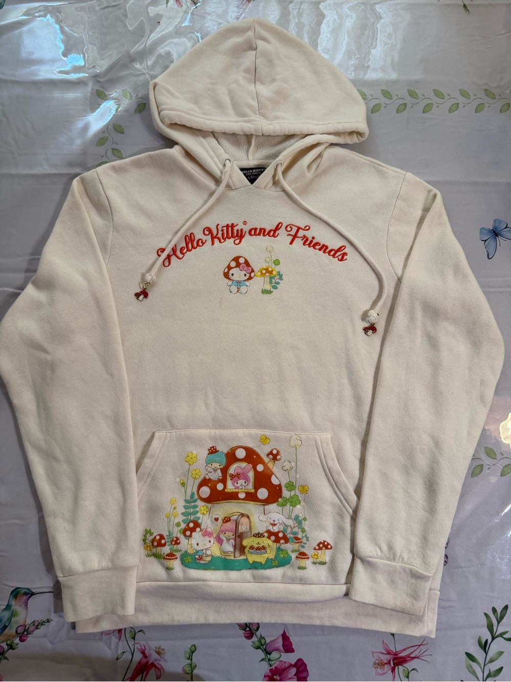 Hello Kitty Cream Hooded Sweatshirt with Mushroom House Graphic